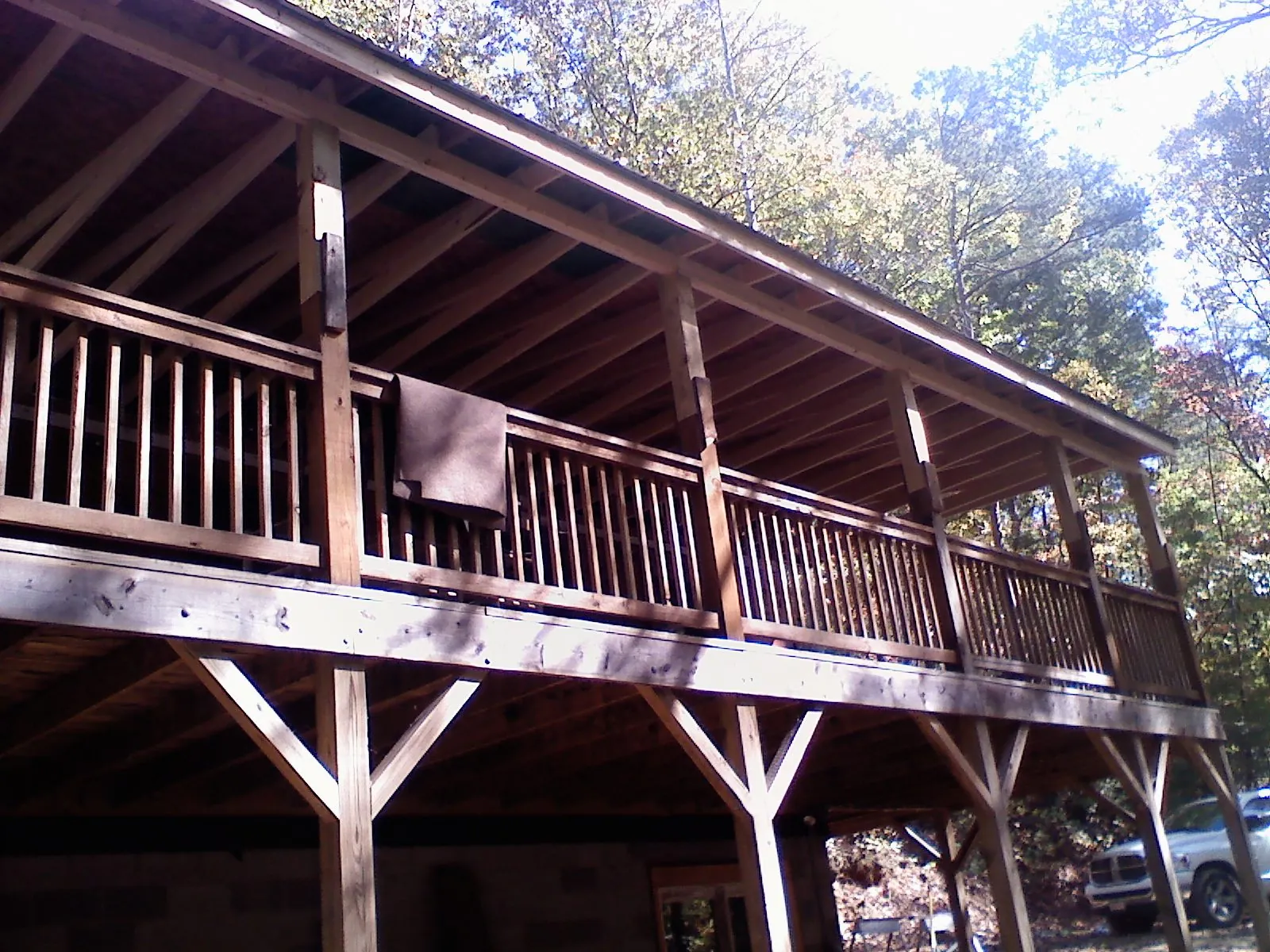 Timber framing under a new elevated porch and deck — Roof Leak Repair in Fairport by Roofing Brothers